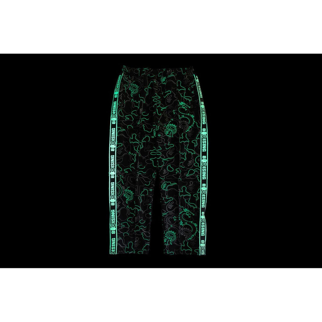 BAPE X 88RISING GLOW IN THE DARK CAMO TRACK PANTS MENS