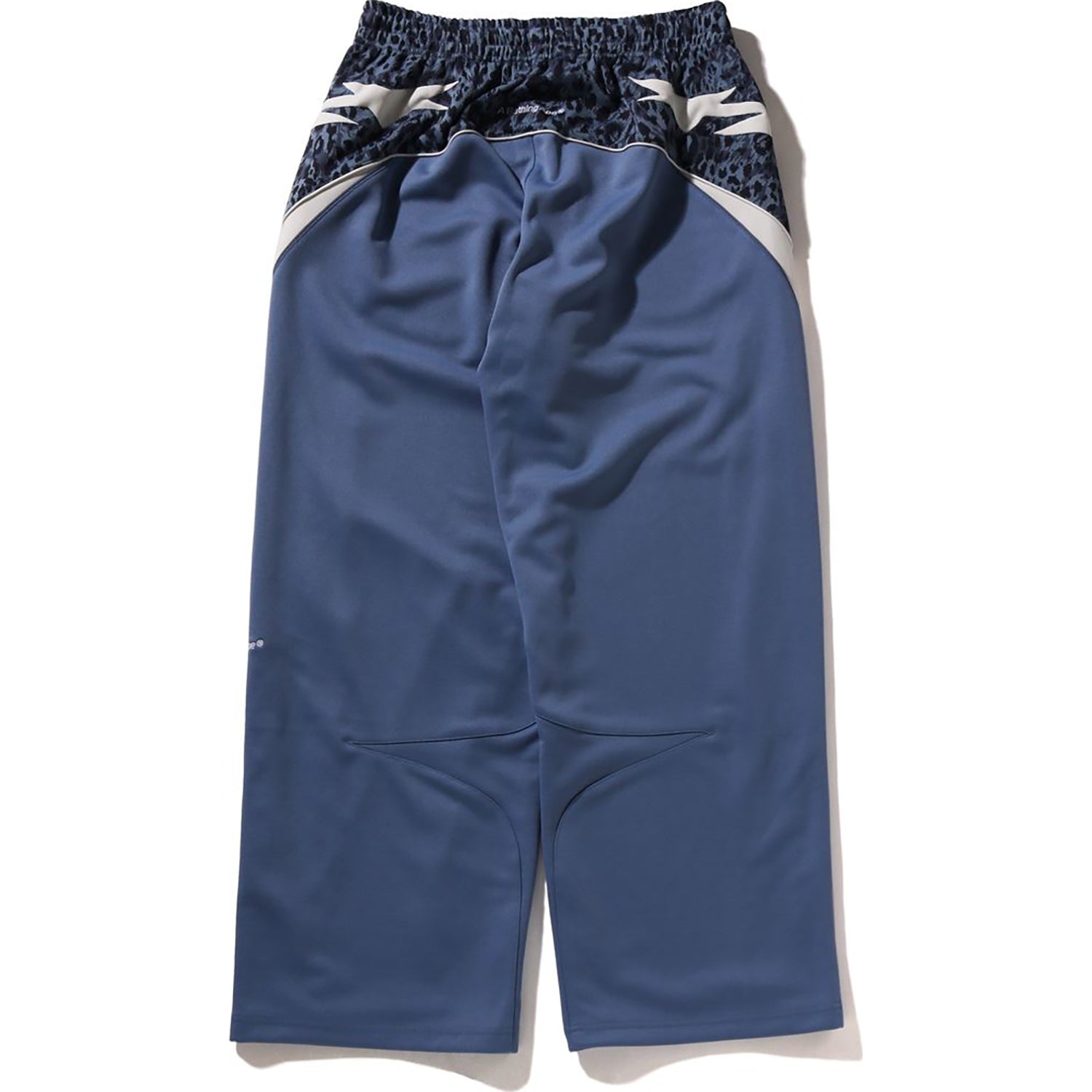 BAPE WILD LEOPARD PATTERN OVERSIZED FIT TRACK PANTS MENS