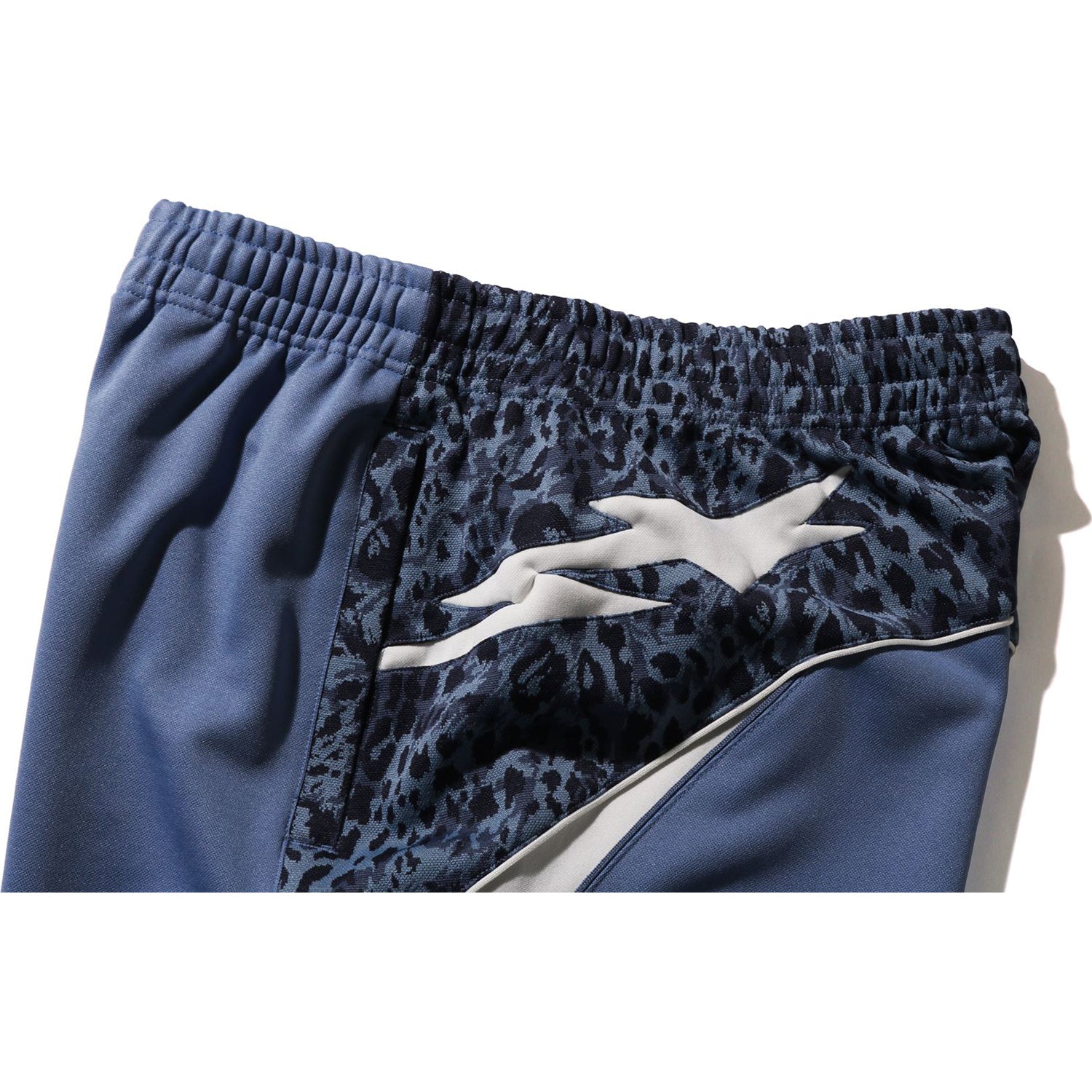 BAPE WILD LEOPARD PATTERN OVERSIZED FIT TRACK PANTS MENS