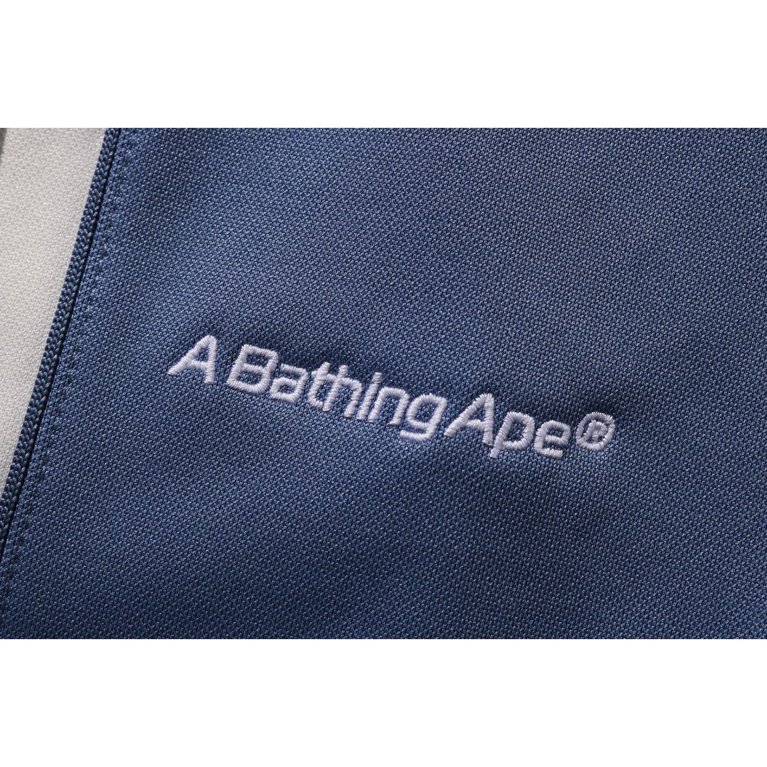 BAPE WILD LEOPARD PATTERN OVERSIZED FIT TRACK PANTS MENS